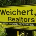 Weichert, Realtors - Mark Thomas Properties Property Management-Logo